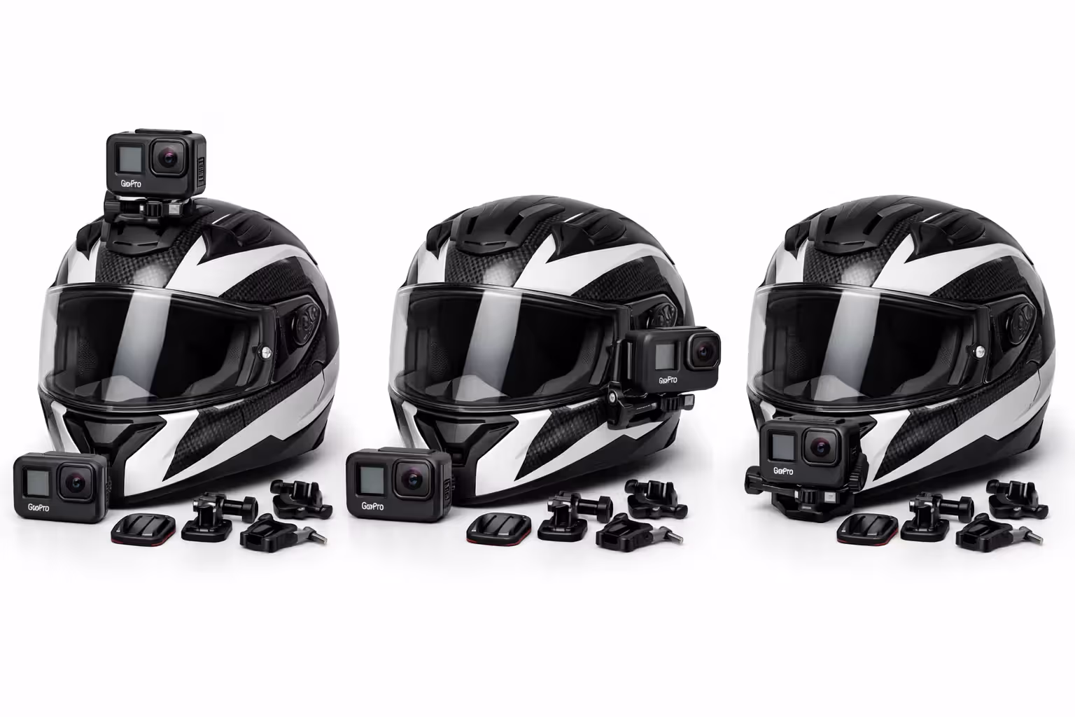 Close-up of a motorcycle helmet showing three different camera mounting positions — top mount, side mount, and chin mount — with a GoPro action camera and mounting accessories on a table